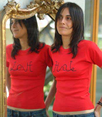 t shirt says hate but in mirror says love
