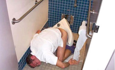 man crashed on toilet